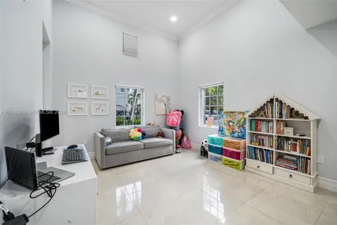a bathroom with a toilet sink and shower