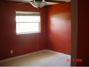 2430 Lisa Melbourne, FL 32935 - Photo 3 of 11 an empty room with a window