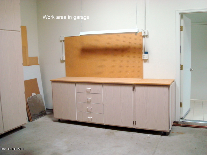 9985 North Desert Sky Road Oro Valley, AZ 85737 - Photo 40 of 43 a utility room with a window