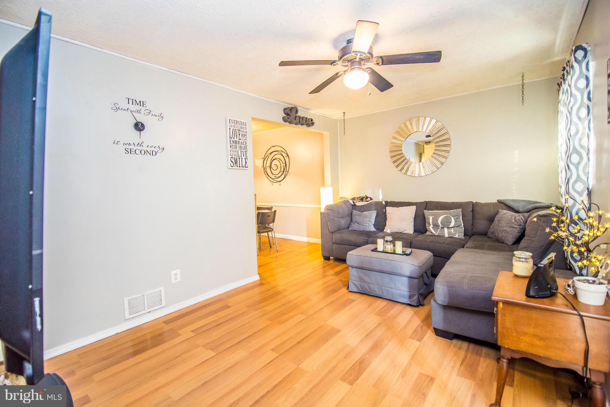 4708 Raspe Avenue Baltimore, MD 21206 - Photo 2 of 23 Living room w/ beautiful pergo flooring