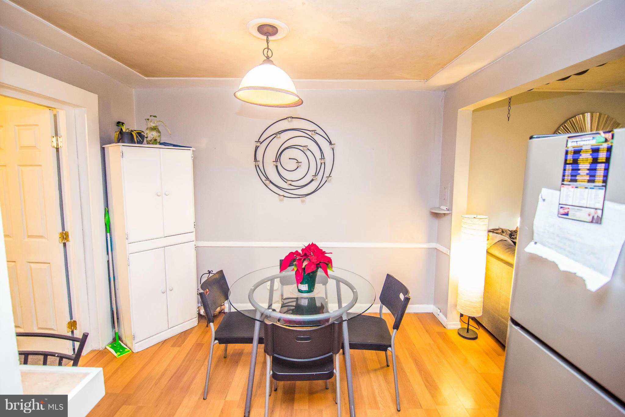 4708 Raspe Avenue Baltimore, MD 21206 - Photo 7 of 23 Open Dining Room w/ pergo flooring