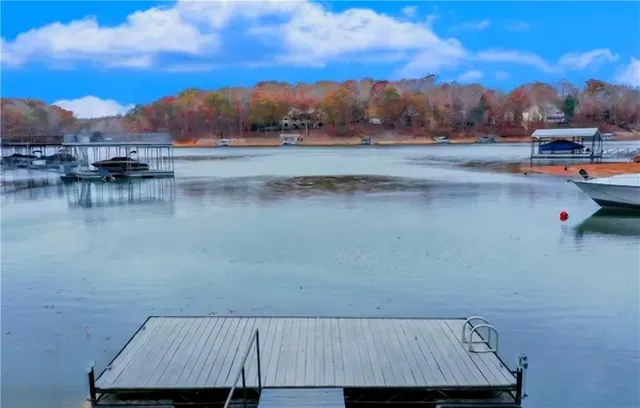 a view of roof deck with sunset view