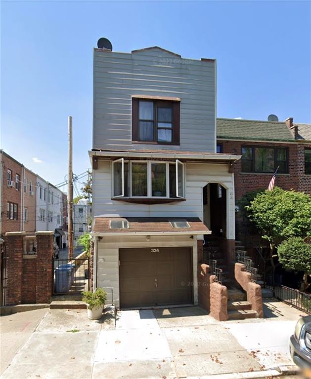 324 97th Street Brooklyn, NY 11209 - Photo 1 of 1 a front view of a house with a yard