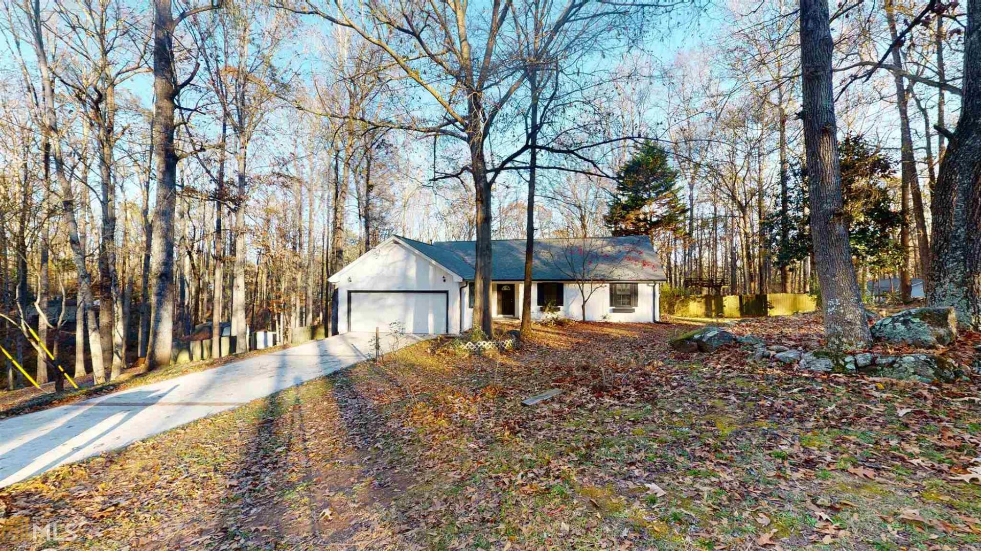 103 Springvalley Circle Stockbridge, GA 30281 - Photo 1 of 1 a front view of a house with a yard