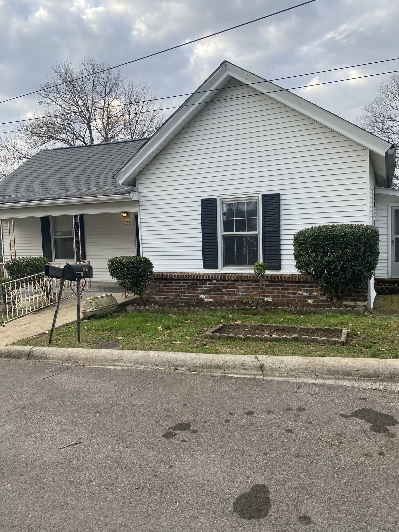 339 West Washington Street Pulaski, TN 38478 - Photo 8 of 23 a front view of house with yard porch and seating