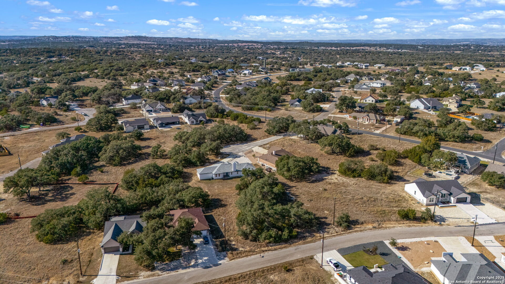 231 Peter Kleid Loop Blanco, TX 78606 - Photo 12 of 26 an aerial view of residential houses with outdoor space