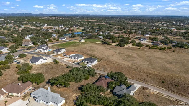 an aerial view of residential building with outdoor space