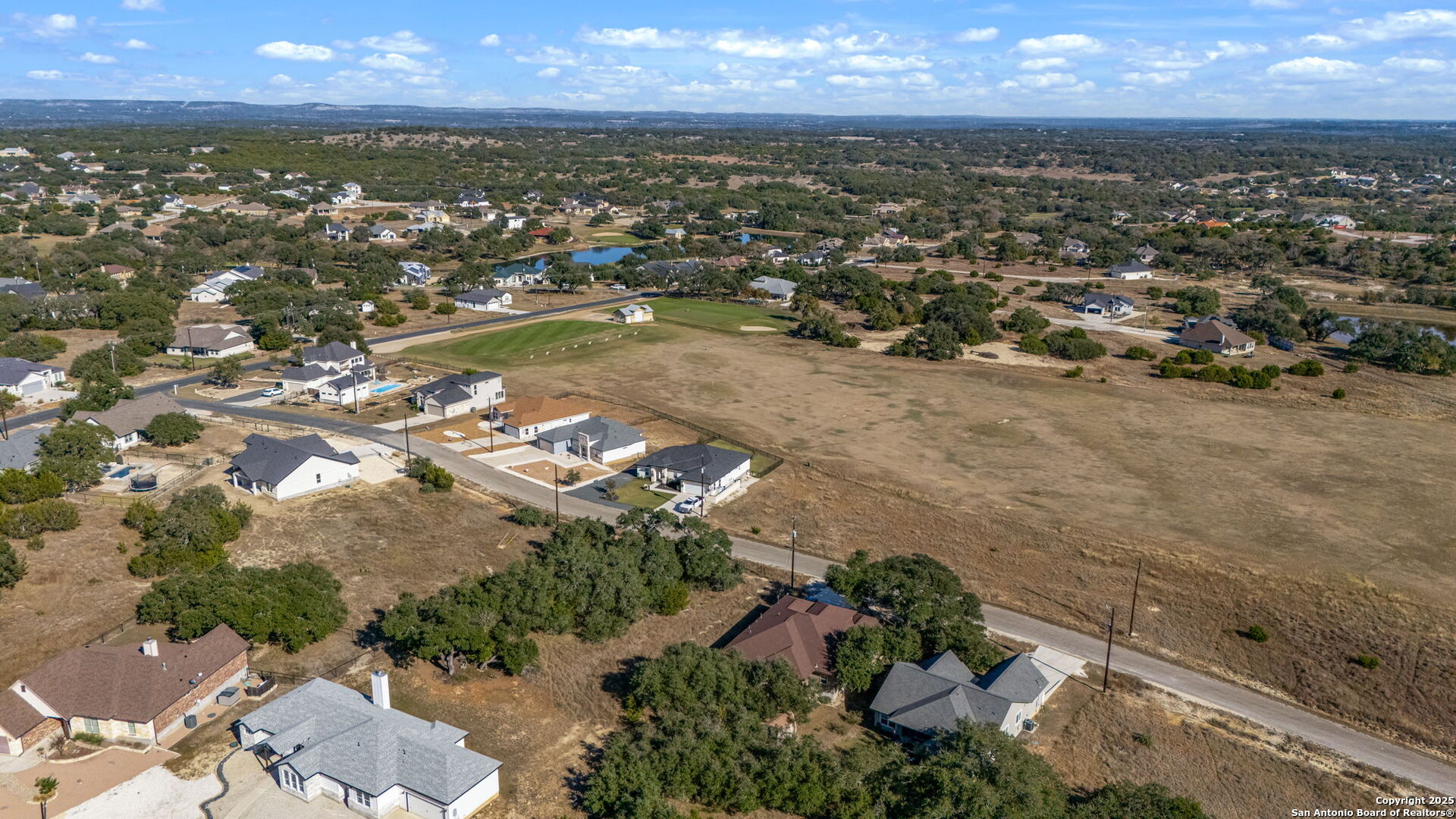 231 Peter Kleid Loop Blanco, TX 78606 - Photo 13 of 26 an aerial view of residential building with outdoor space
