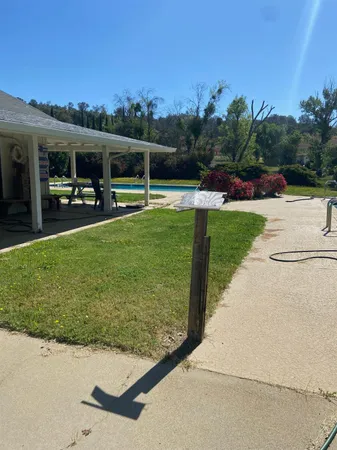 a view of outdoor space yard and swimming pool