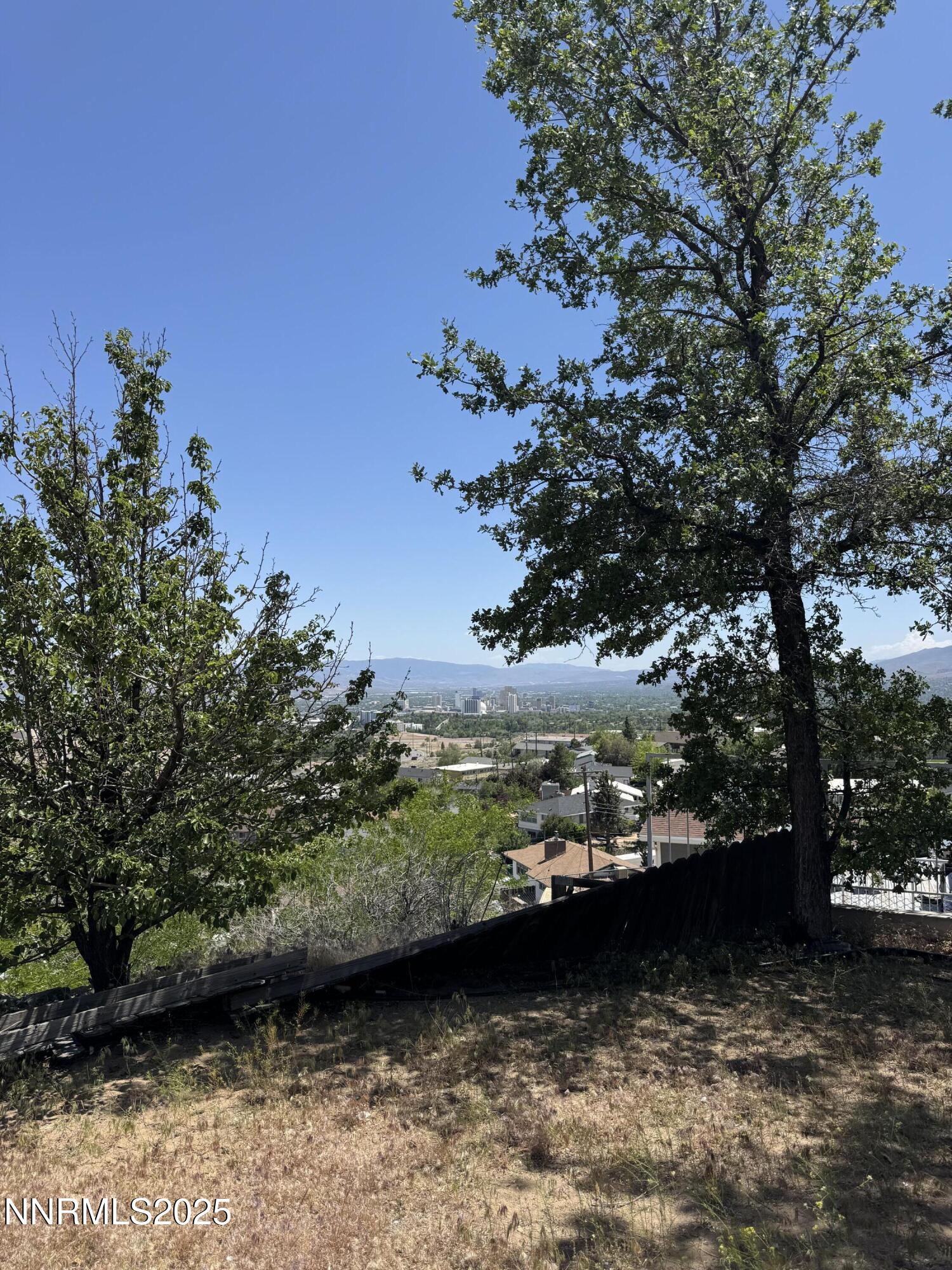 3696 Shale Court, Unit END OF A CUL DE SAC Reno, NV 89503 - Photo 2 of 5 a view of a lake with a outdoor space