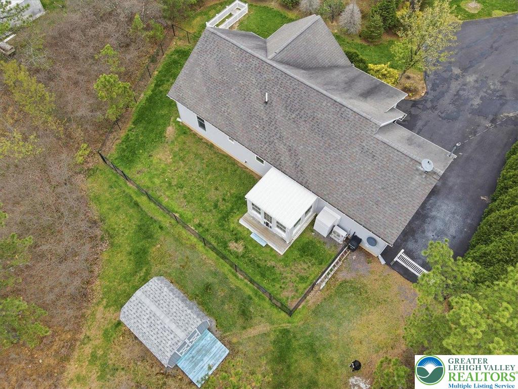 64 Robertson Road Jim Thorpe, PA 18229 - Photo 46 of 54 an aerial view of a house with a yard and trees