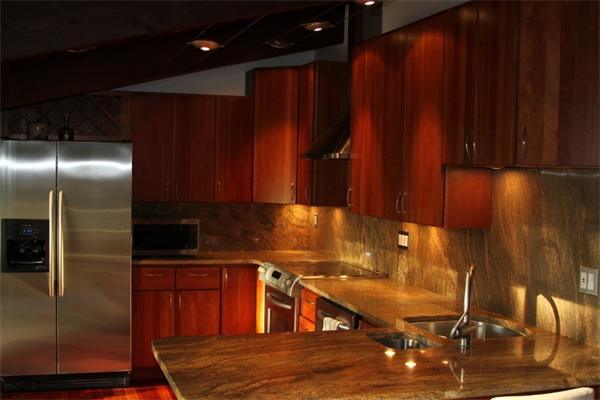 43 Belvedere Road Boxford, MA 01921 - Photo 3 of 17 a kitchen with wooden cabinets and stainless steel appliances