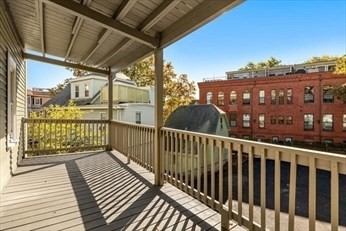 348 Centre Street, Unit 3 Boston, MA 02130 - Photo 15 of 17 a view of a balcony with wooden floor