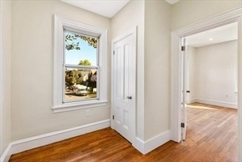 348 Centre Street, Unit 3 Boston, MA 02130 - Photo 9 of 17 a view of a room with wooden floor and window