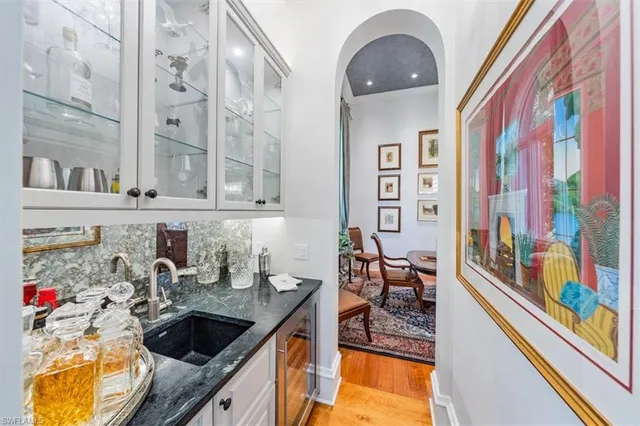 a kitchen with stainless steel appliances granite countertop a stove and a sink