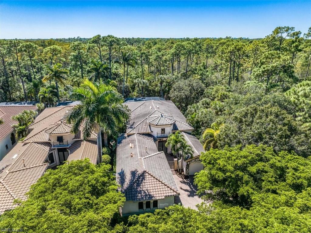 18051 Lagos Way Naples, FL 34110 - Photo 26 of 26 an aerial view of a house with a yard