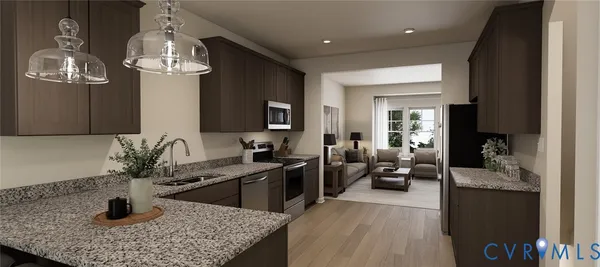 a kitchen with a sink a counter space and living room view