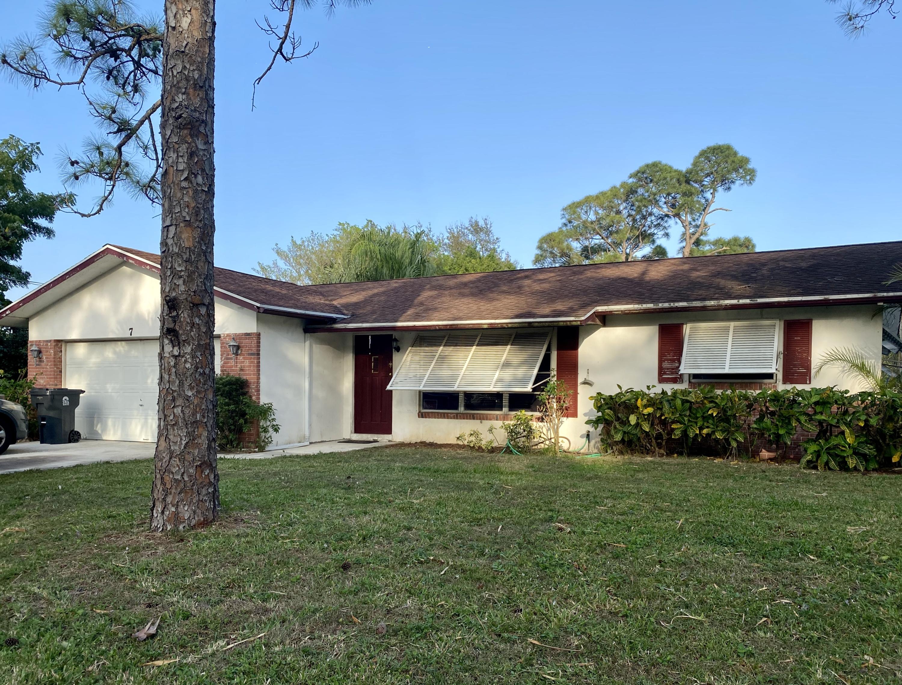 7 Akron Road Lake Worth, FL 33467 - Photo 1 of 2 Front