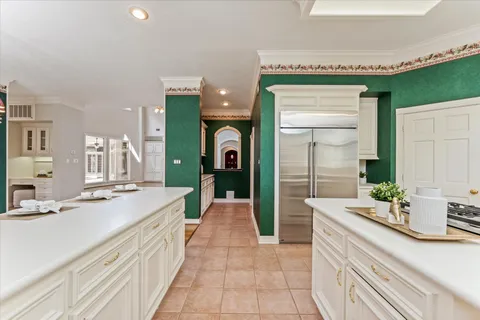 a bathroom with a sink a mirror and a shower