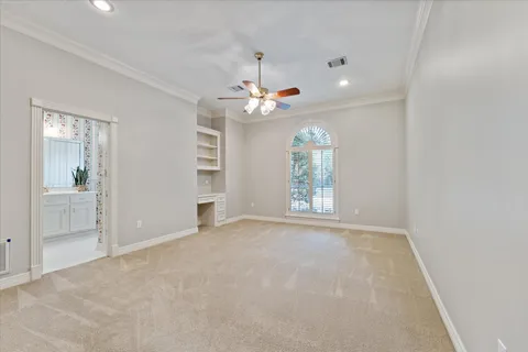 en view of an empty room with a window