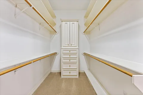 a view of a hallway with stairs