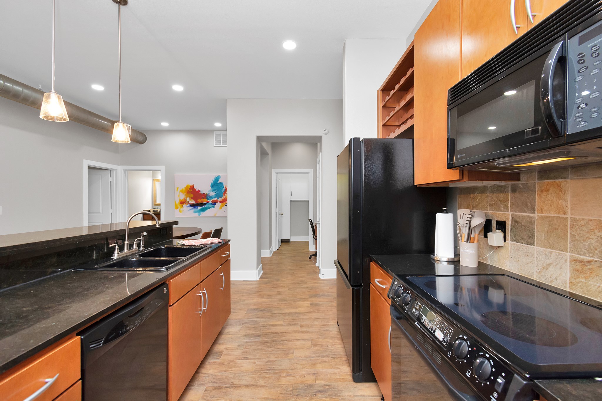 1901 Post Oak Boulevard, Unit 3113 Houston, TX 77056 - Photo 8 of 34 The kitchen includes plenty of cabinetry for storing all your cooking gadgets and tools. Additionally, there is wine storage available – perfect for those who love to host.