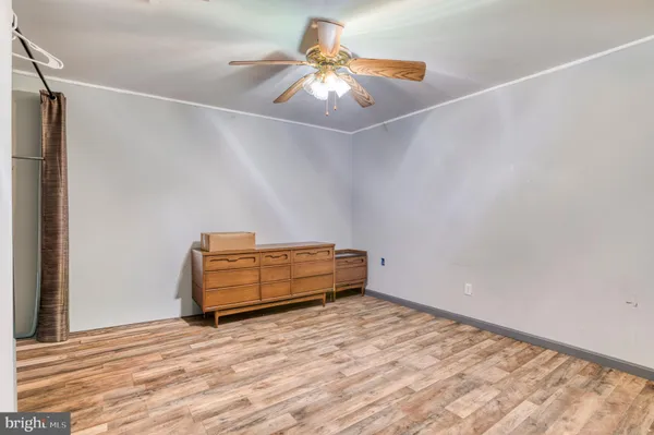 a view of a house with backyard porch and sitting area