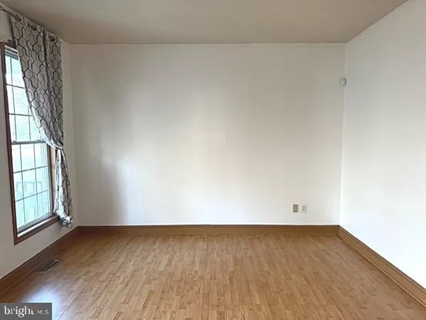 a living room with furniture fireplace and flat screen tv