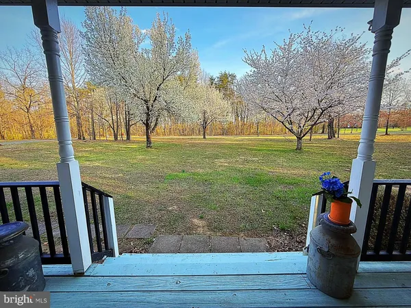 an aerial view of a city and mountain view in back
