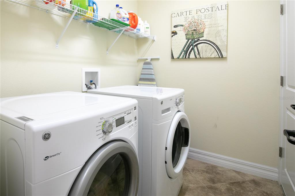 3651 Limestone Street Clermont, FL 34711 - Photo 22 of 41 a utility room with dryer and washer