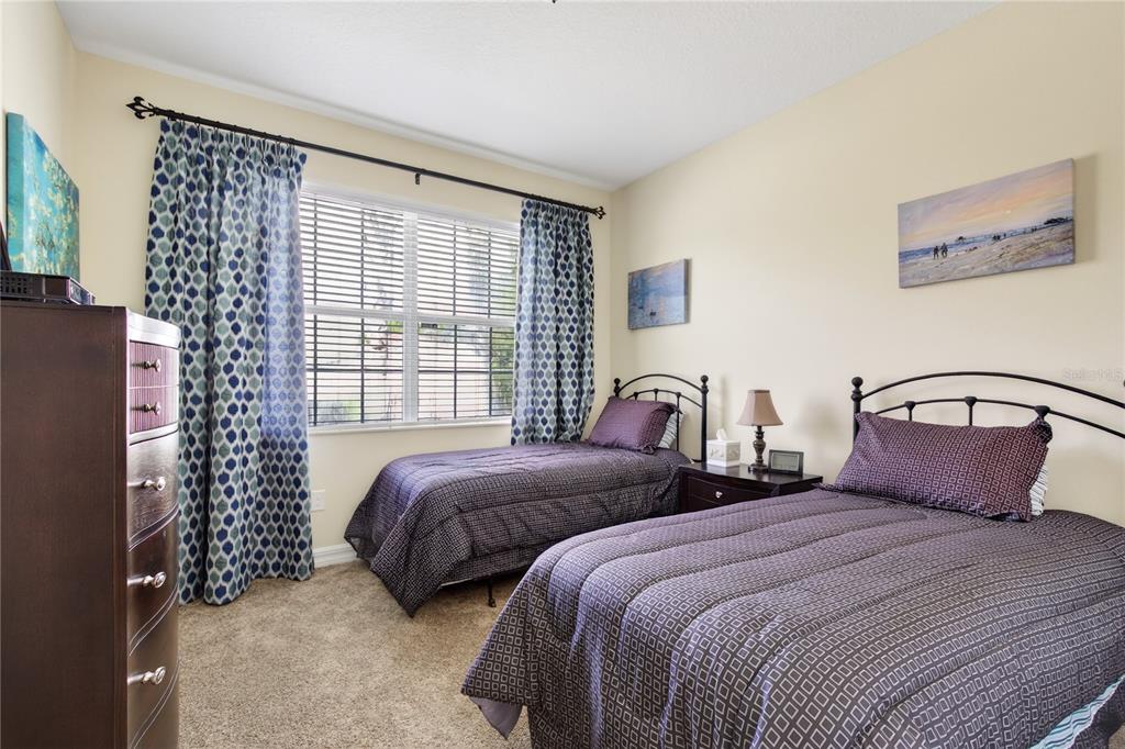 3651 Limestone Street Clermont, FL 34711 - Photo 23 of 41 a bedroom with bed and a window