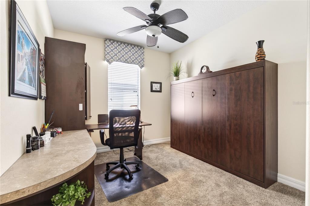 3651 Limestone Street Clermont, FL 34711 - Photo 26 of 41 a workspace with furniture and window