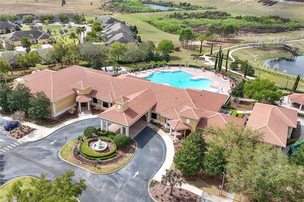 3651 Limestone Street Clermont, FL 34711 - Photo 34 of 41 an aerial view of a house with garden space and lake view
