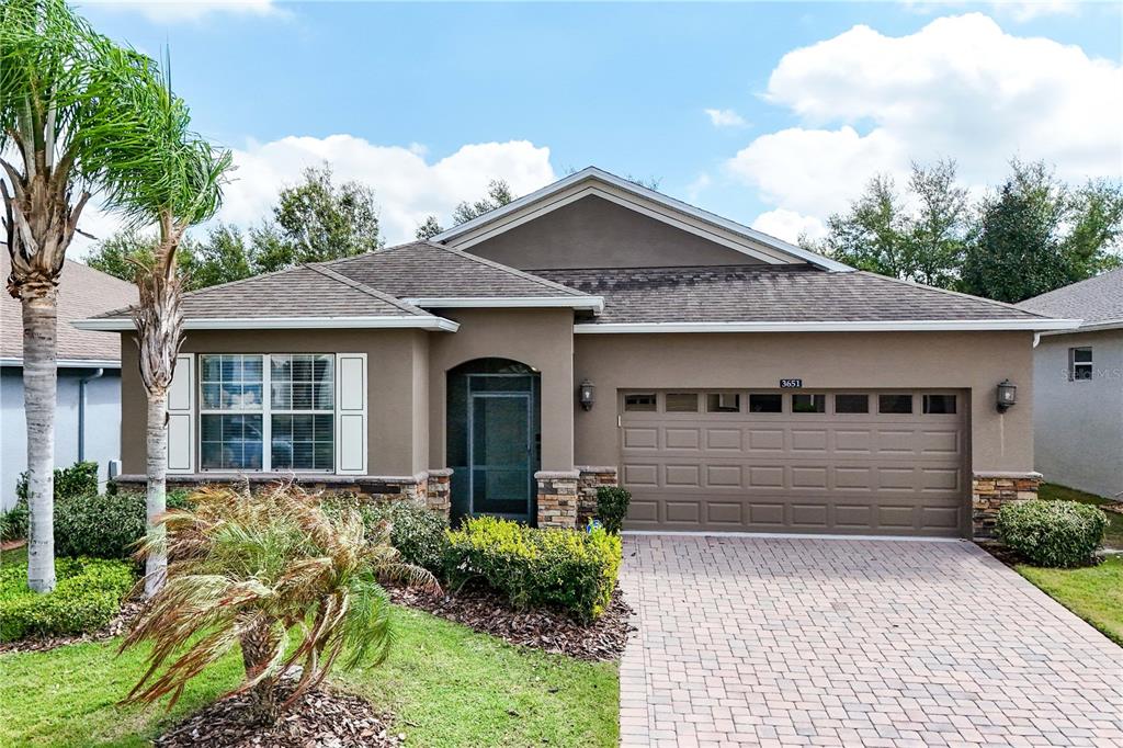 3651 Limestone Street Clermont, FL 34711 - Photo 41 of 41 a front view of a house with a yard