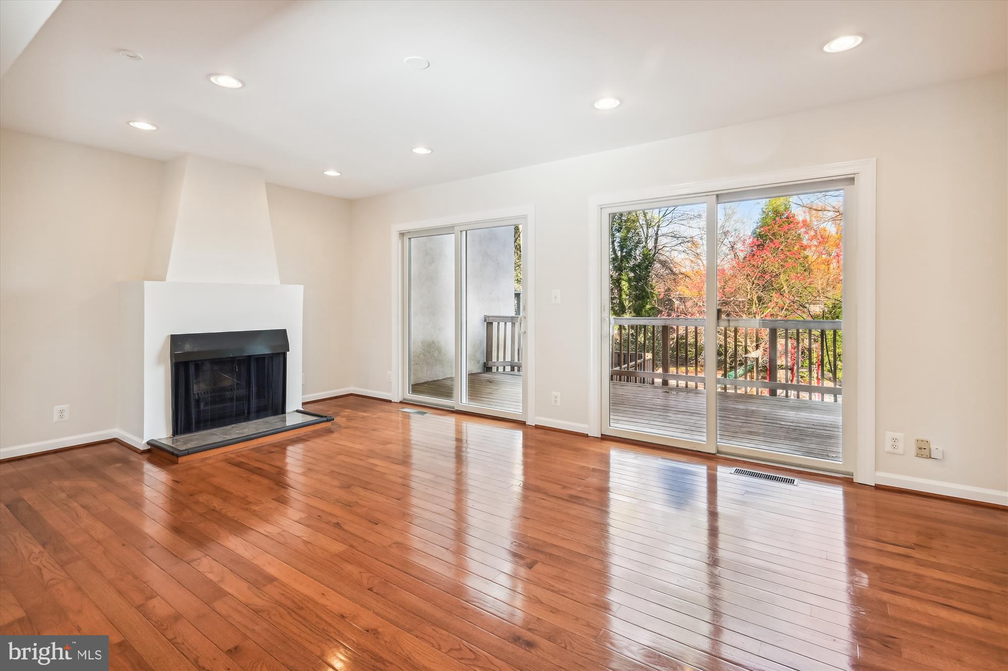 1640 Valencia Way Reston, VA 20190 - Photo 4 of 53 Double sliding glass doors lead to deck