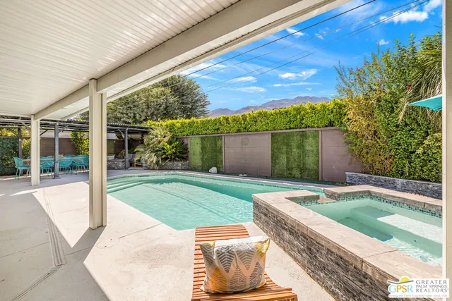 a house view with a backyard space
