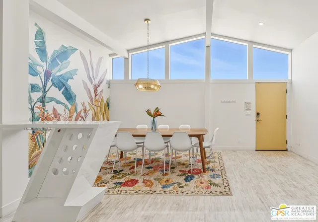 a living room with a couch and a table