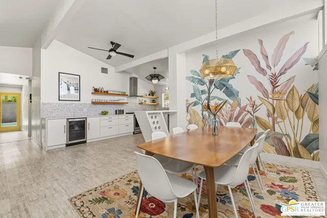 a dining room with furniture and window