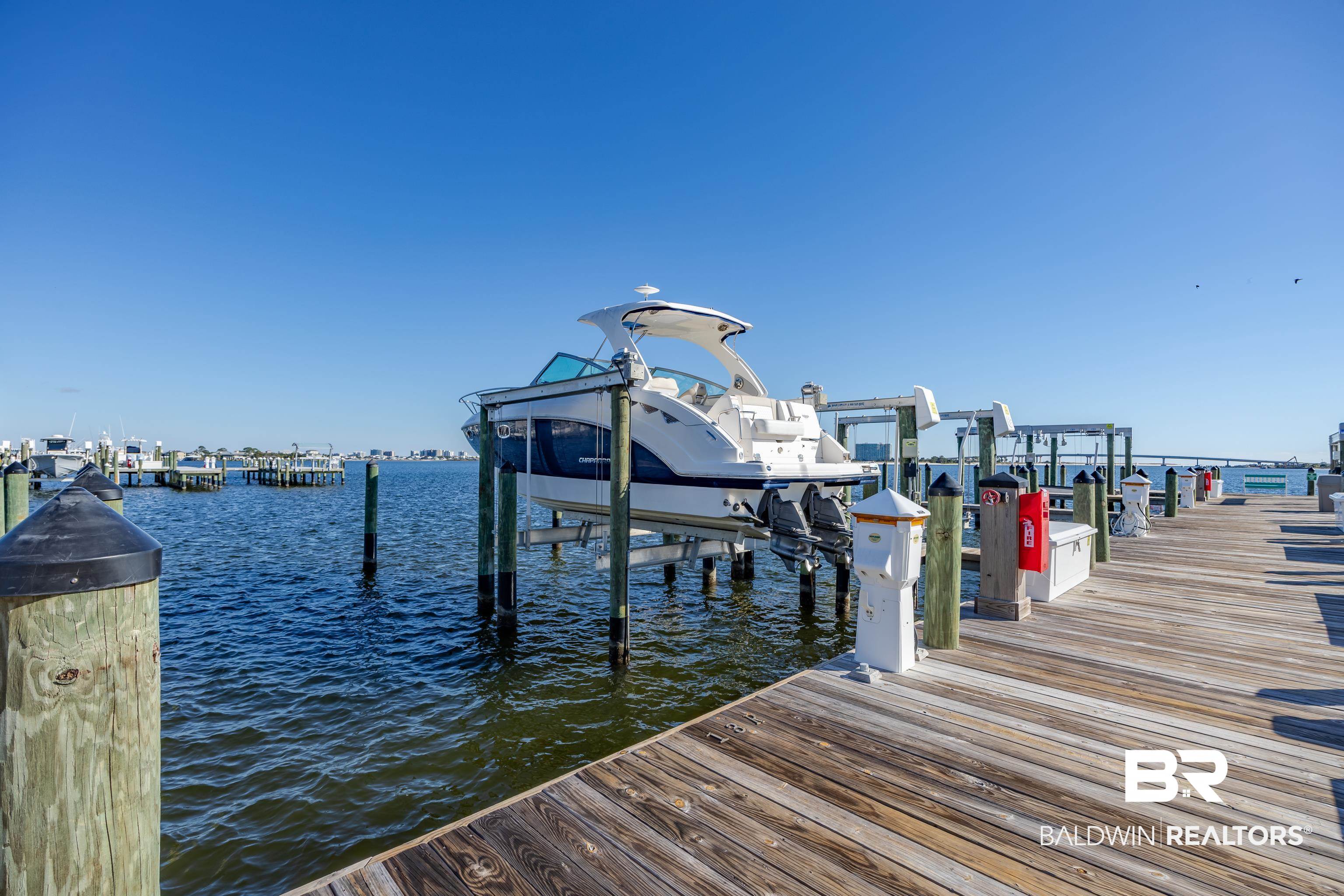 27580 Canal Road, Unit 1431 Orange Beach, AL 36561 - Photo 47 of 73 Dock area featuring a water view and boat lift