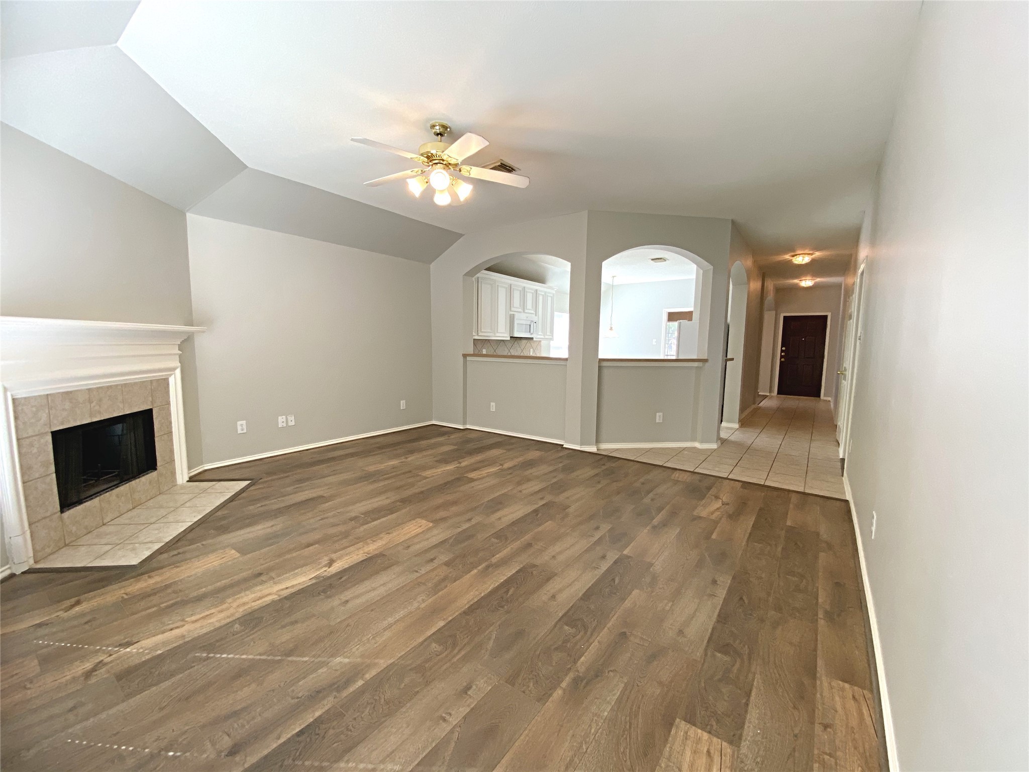 22014 Gold Leaf Trail Cypress, TX 77433 - Photo 14 of 25 a view of empty room with a fireplace