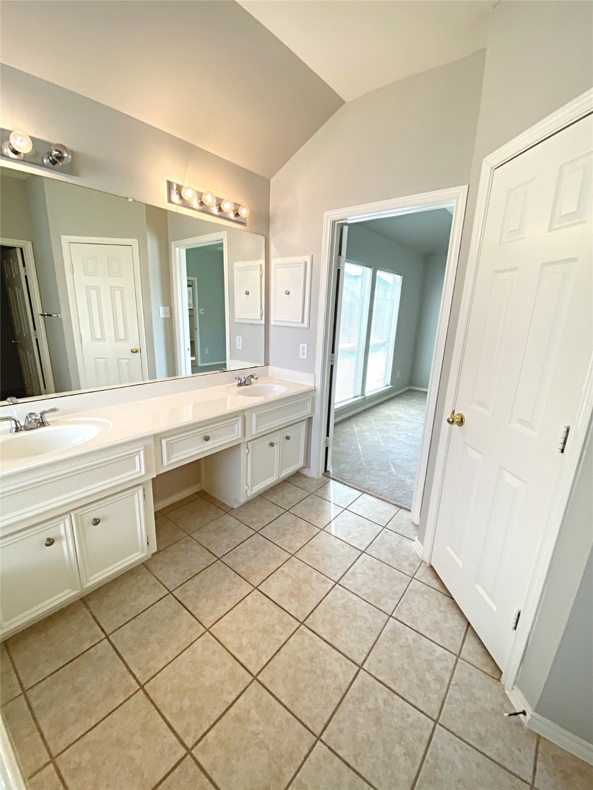 22014 Gold Leaf Trail Cypress, TX 77433 - Photo 19 of 25 a bathroom with a sink vanity and mirror