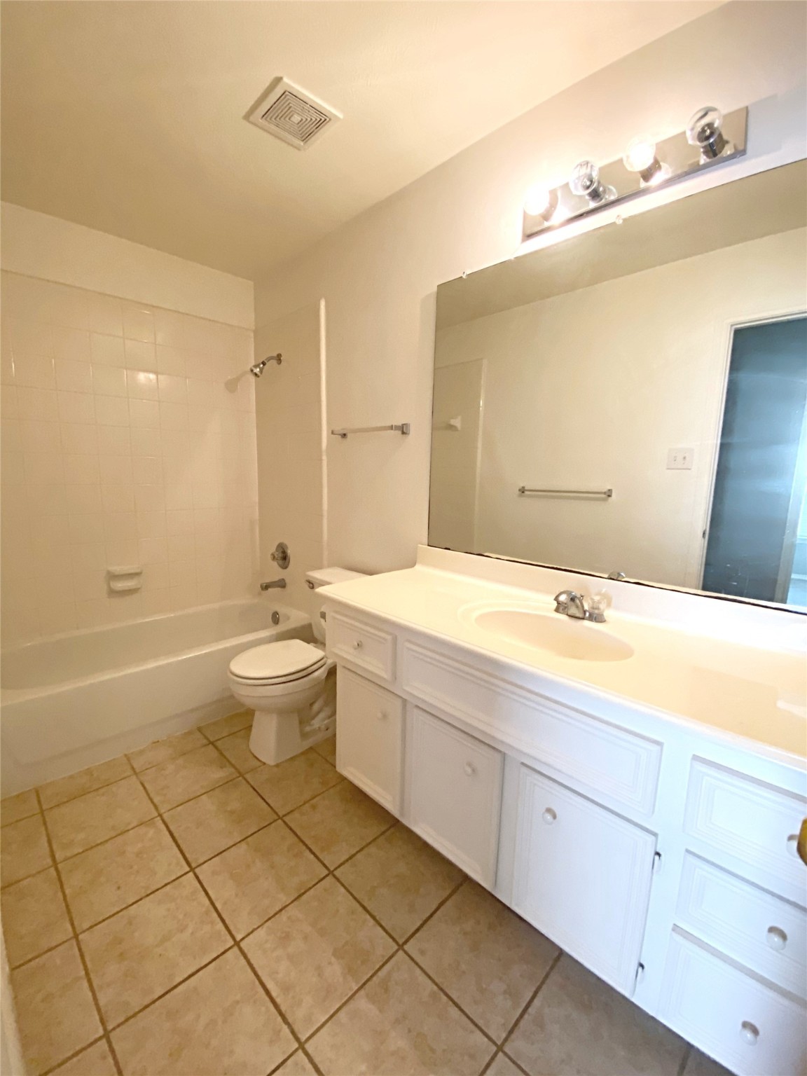 22014 Gold Leaf Trail Cypress, TX 77433 - Photo 23 of 25 a bathroom with a double vanity sink a toilet and a tub