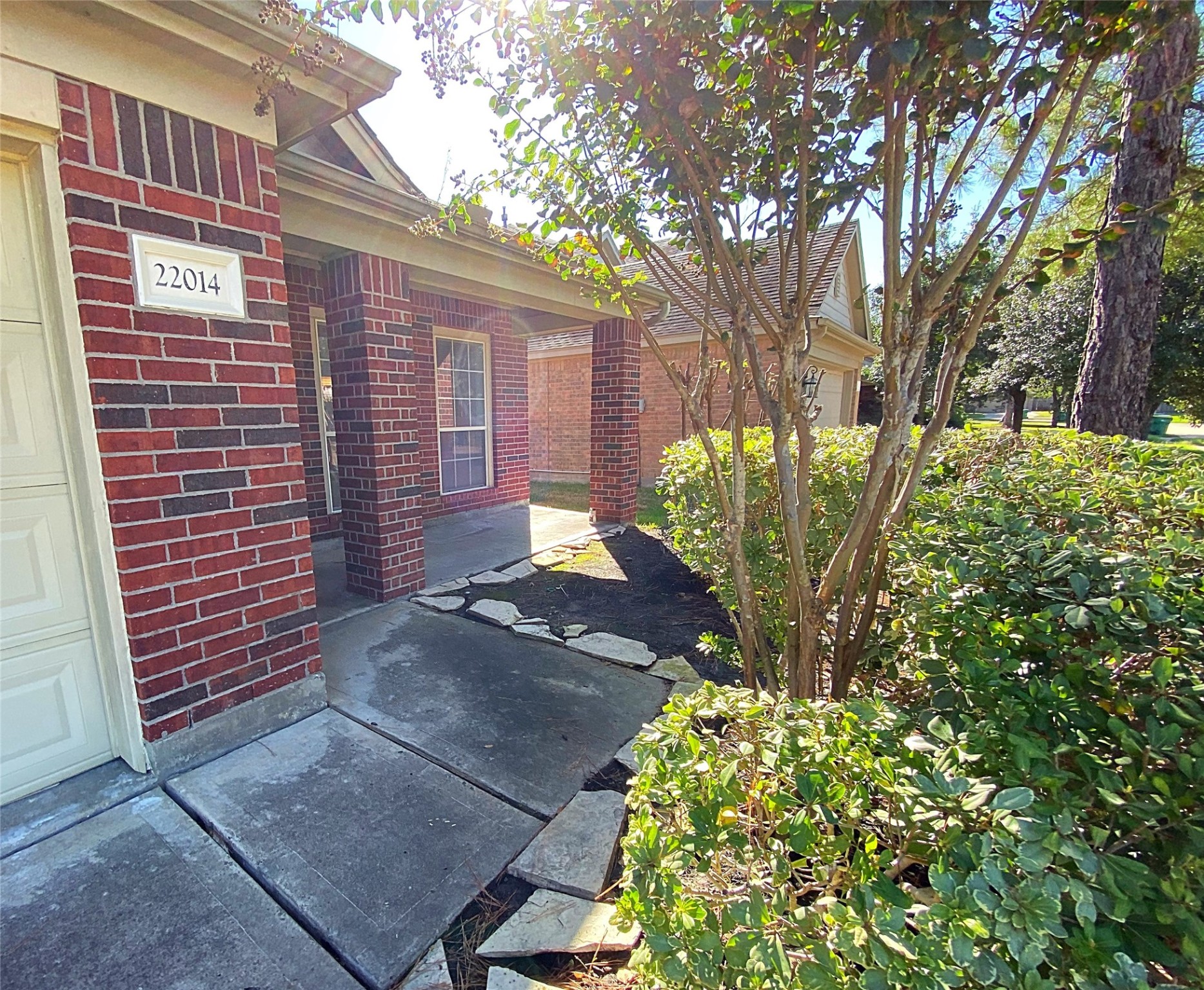 22014 Gold Leaf Trail Cypress, TX 77433 - Photo 3 of 25 a view of a backyard with plants