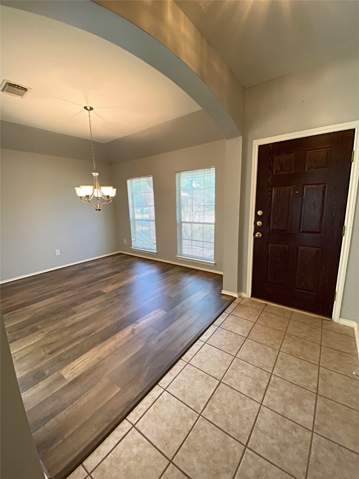 22014 Gold Leaf Trail Cypress, TX 77433 - Photo 5 of 25 a view of empty room with wooden floor and window