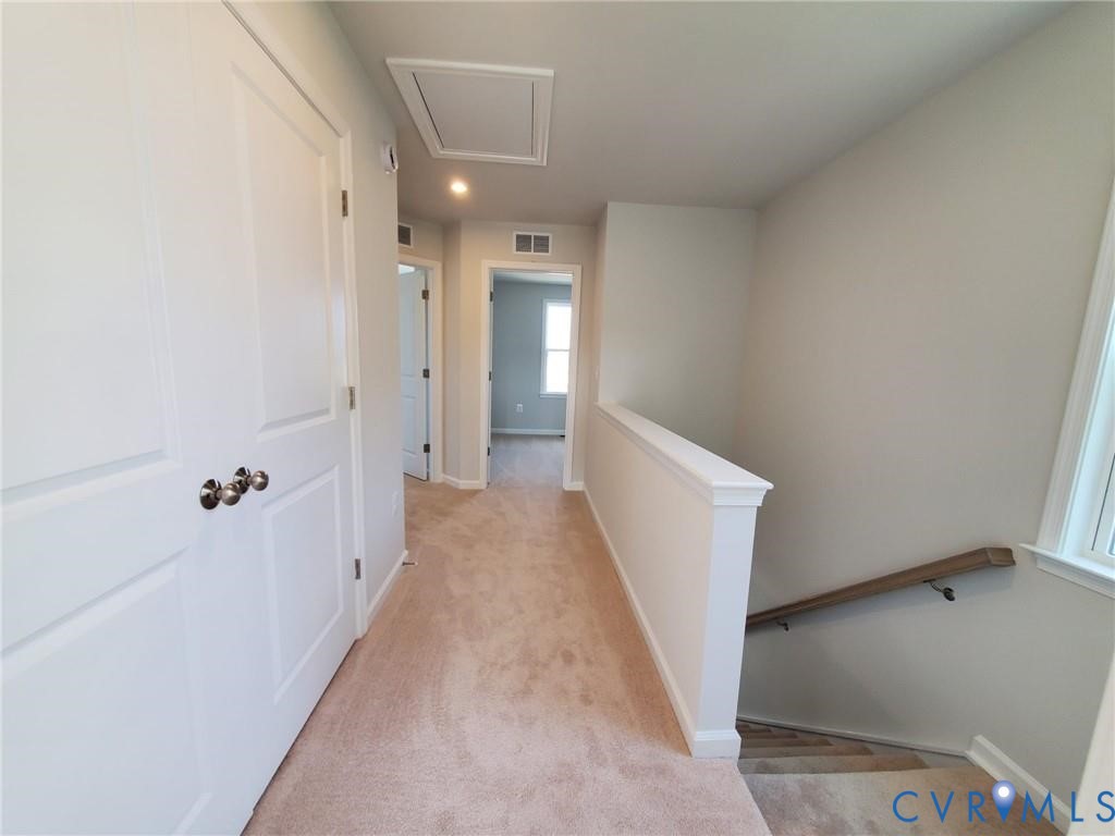 8833 Foxway Ridge Lane Glen Allen, VA 23060 - Photo 20 of 27 a view of a hallway with white walls