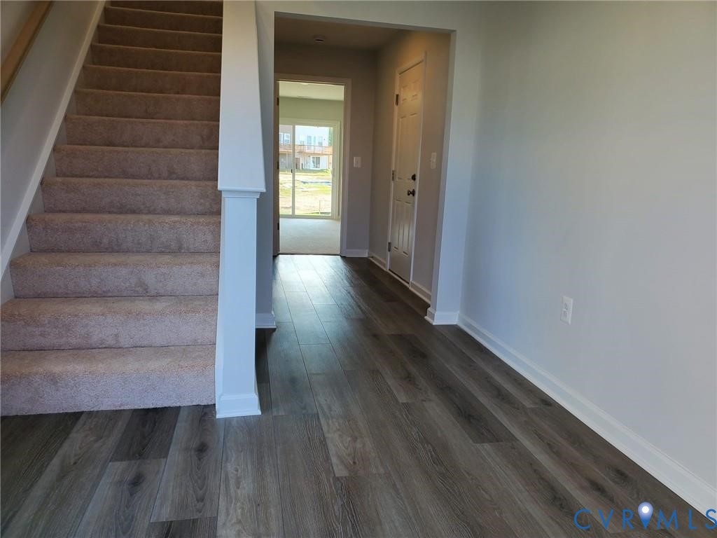 8833 Foxway Ridge Lane Glen Allen, VA 23060 - Photo 2 of 27 a view of entryway with wooden floor