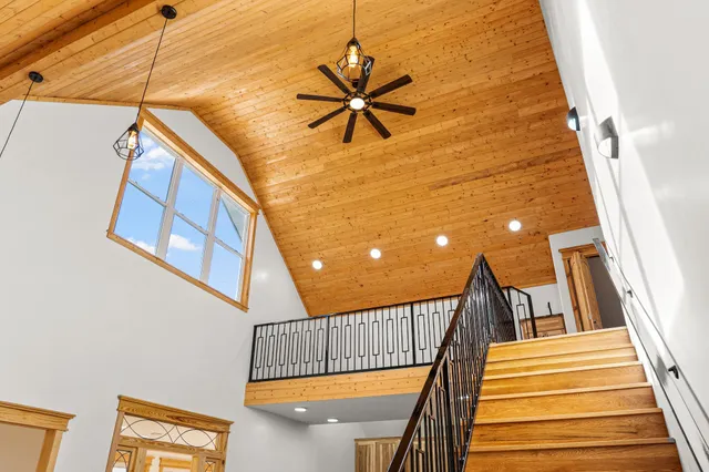 a view of a room with window and hardwood floor