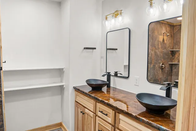 a view of a bathroom from the hallway