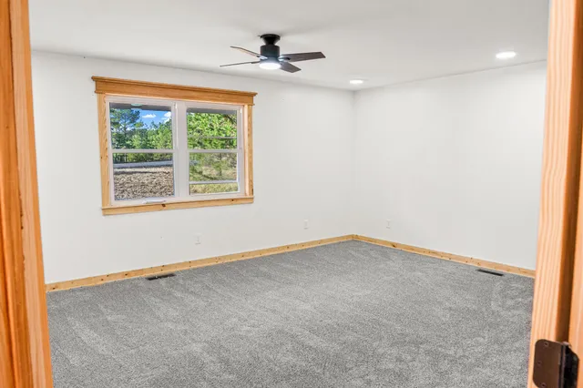 a bathroom with a glass door