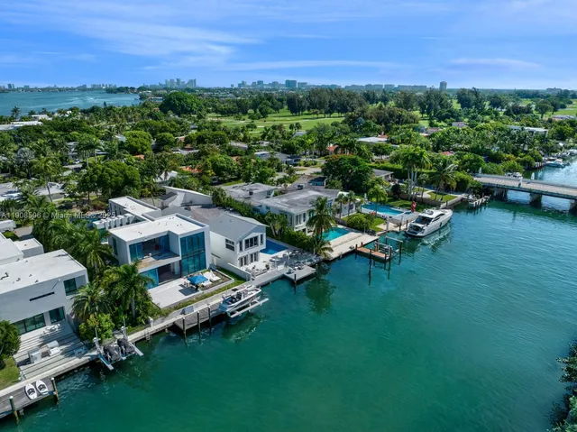 a view of a town with residential house in the background